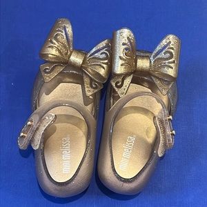 Sparkly gold bow Mini Melissa shoes size 5